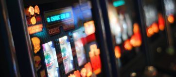 A collection of slightly blurred slot machines