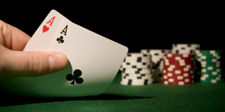 poker hand and chips